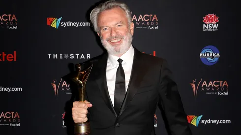 Sam Neill poses with the Longford Lyell Award in the media room during 2019 AACTA Awards Presented by Foxtel at The Star on December 04, 2019 in Sydney, Australia.