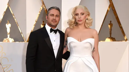 Recording artist Lady Gaga (R) and actor Taylor Kinney attend the 88th Annual Academy Awards at Hollywood & Highland Center on February 28, 2016 in Hollywood, California.