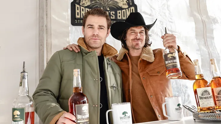 (L-R) Paul Wesley and Ian Somerhalder attend the St. Regis World Snow Polo Championships at Rio Grande Park on December 19, 2024 in Aspen, Colorado.