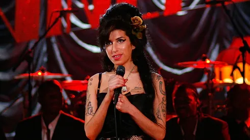 British singer Amy Winehouse performs at the Riverside Studios for the 50th Grammy Awards ceremony via video link on February 10, 2008 in London, England. Winehouse won 5 out of her 6 nominations including, record of the year, best new artist, song of the year, pop vocal album and female pop vocal performance.