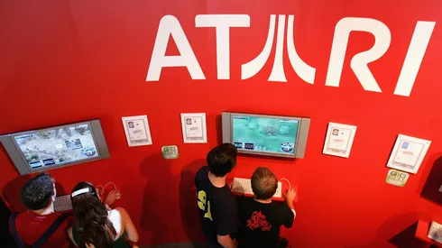 Visitors watch and play Atari's games.