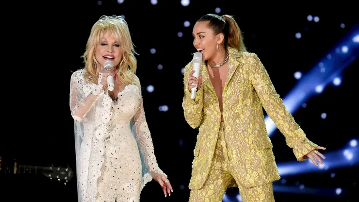 Dolly Parton (L) and Miley Cyrus perform onstage during the 61st Annual GRAMMY Awards at Staples Center on February 10, 2019 in Los Angeles, California.